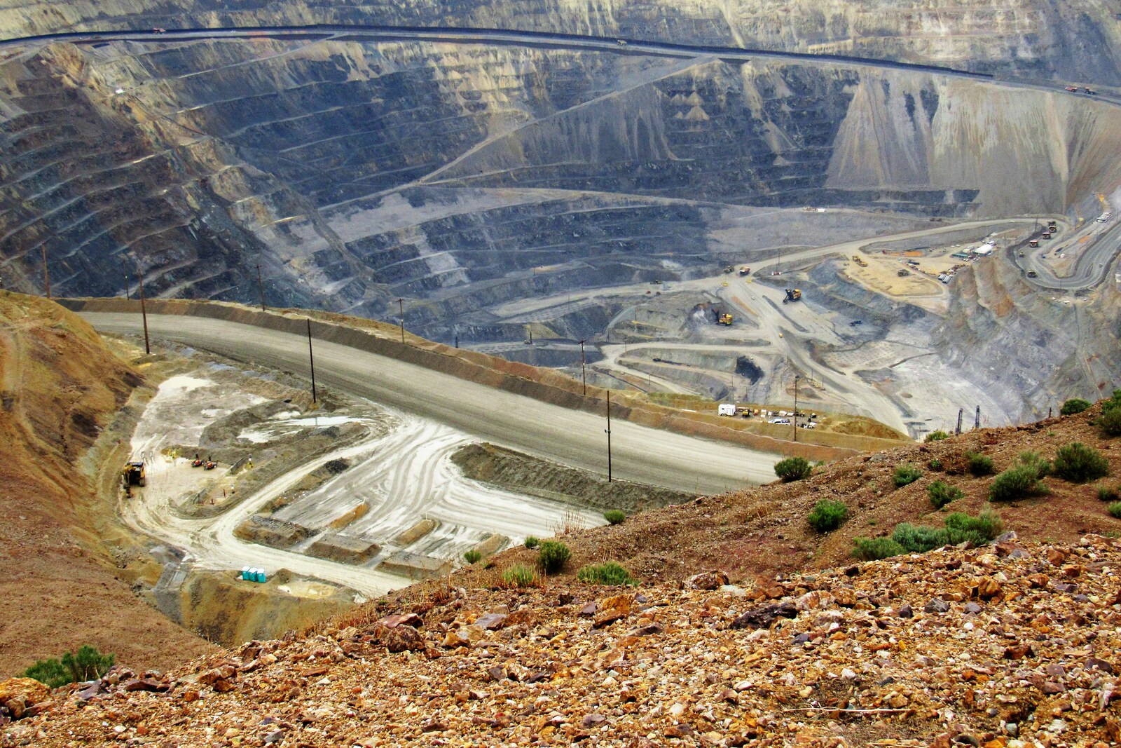 Aerial view of a terraced open-pit copper mine